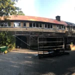 windows are placed in the roof extention farm house in Tilburg